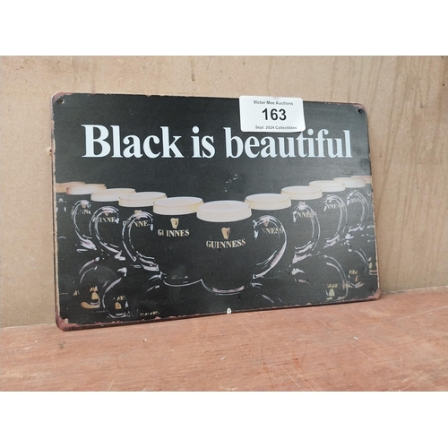 163 - Black is Beautiful Guinness tin plate advertising sign. {20 cm H x 30 cm W}.