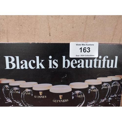 163 - Black is Beautiful Guinness tin plate advertising sign. {20 cm H x 30 cm W}.