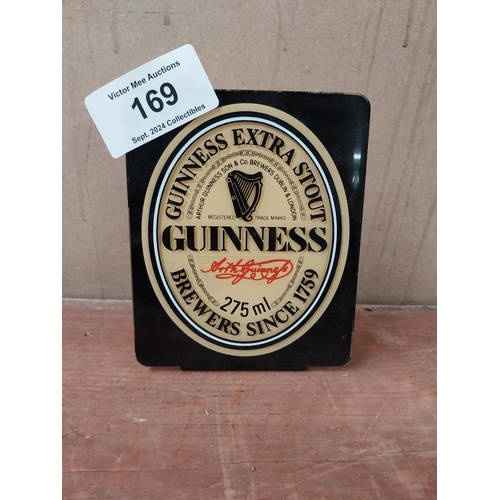 169 - Guinness perspex advertising shelf sign. {16 cm H x 13 cm W}