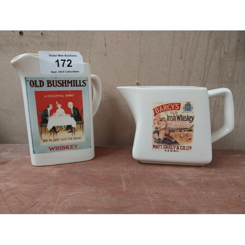 172 - Old Bushmills Whiskey ceramic water jug. {18 cm H x 15 cm W x 10 cm D} and D'Arcy's Old Irish Whiske... 