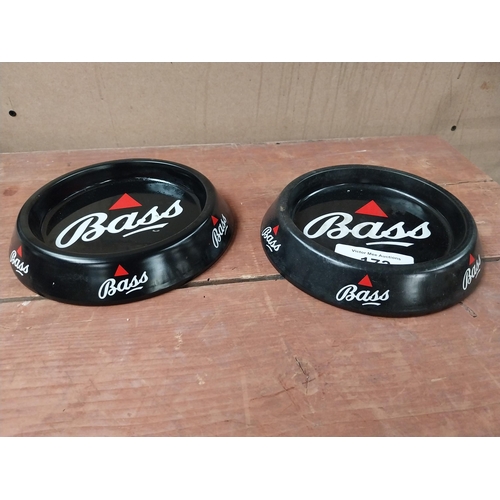 173 - Two Bass tin plate advertising ashtrays. {4 cm H x 20 cm Diam.}