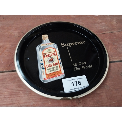 176 - Gordon's Gin tin plate drinks tray. {26cm Diam.}.