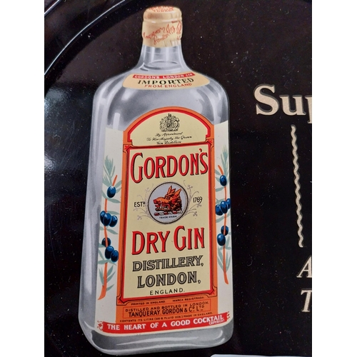 176 - Gordon's Gin tin plate drinks tray. {26cm Diam.}.