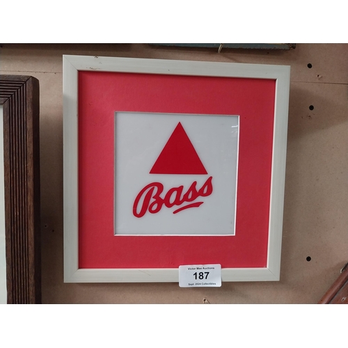 187 - Bass Perspex framed advertising sign. {33 cm H x 33 cm W}.