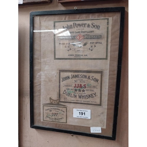 191 - Framed collection of three John Jameson and John Powers Whiskey labels. {44 cm H x 35 cm W}.