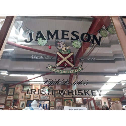 193 - Jameson Triple Distilled Irish Whiskey framed advertising mirror. {63 cm H x 48 cm W}