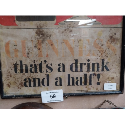 59 - Guinness That's a Drink and a half framed advertising print. {59 cm W x 45 cm W}.