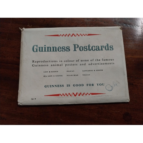 201 - Two packs of Guinness advertising postcards in original packets.