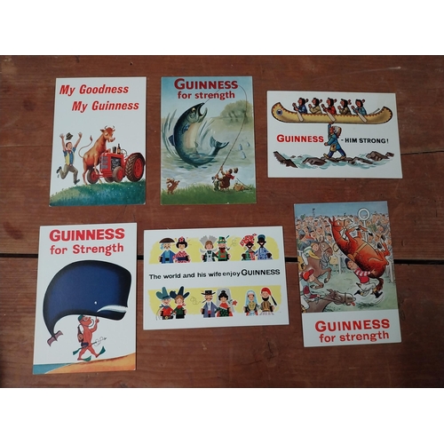 201 - Two packs of Guinness advertising postcards in original packets.