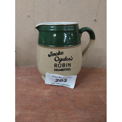 203 - Ogden's Robin cigarettes advertising jug {14cm H x 15cm W x 10cm D}.