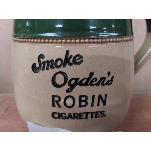 203 - Ogden's Robin cigarettes advertising jug {14cm H x 15cm W x 10cm D}.