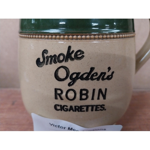 203 - Ogden's Robin cigarettes advertising jug {14cm H x 15cm W x 10cm D}.