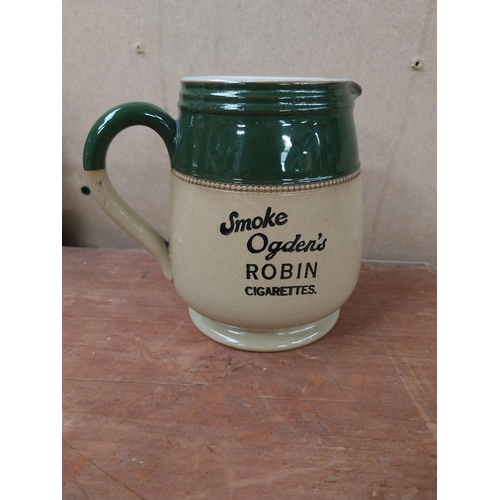 203 - Ogden's Robin cigarettes advertising jug {14cm H x 15cm W x 10cm D}.