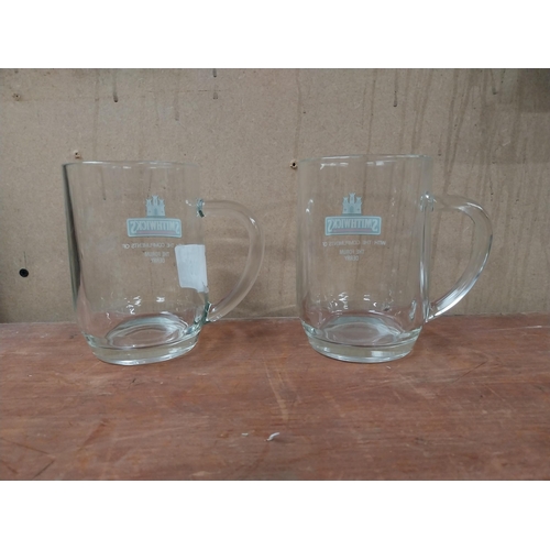 206 - Two Smithwick's glasses with the compliments of The Forum Derry {13 cm H x 13 cm W x 9 cm D].