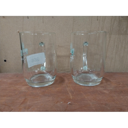 206 - Two Smithwick's glasses with the compliments of The Forum Derry {13 cm H x 13 cm W x 9 cm D].