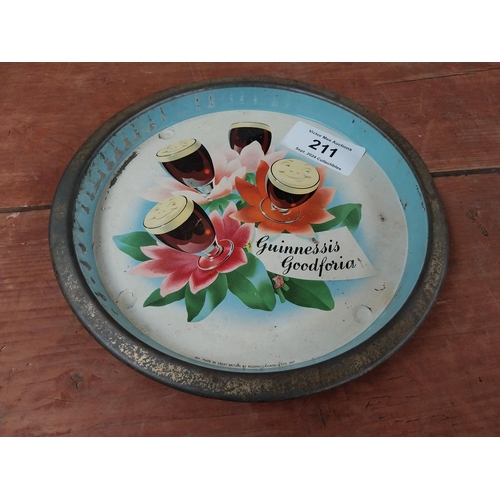 211 - Guinness is Good For you tin plate advertising drinks tray. {2 cm H x 27 cm Diam.}.