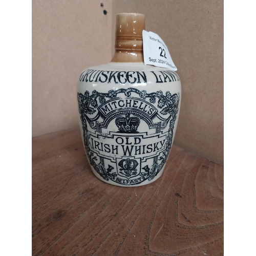 22 - 19th C. Cruiskeen Lawn Old Irish Whiskey stoneware flagon. {19 cm H x 11 cm W x 11 cm D}.