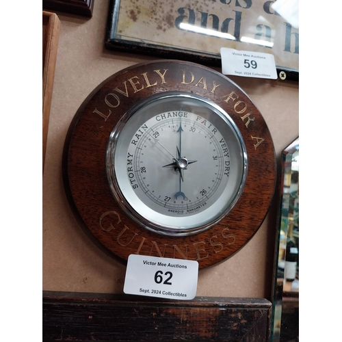 62 - Wooden Guinness advertising barometer. {20 cm Diam.}.