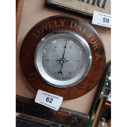 62 - Wooden Guinness advertising barometer. {20 cm Diam.}.