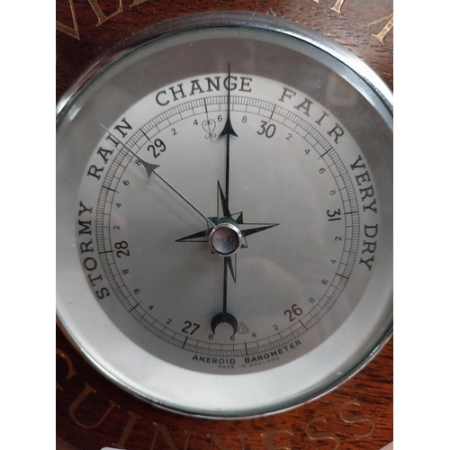 62 - Wooden Guinness advertising barometer. {20 cm Diam.}.