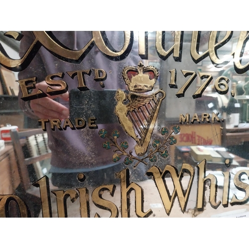 64 - McConnell's Old Irish Whisky Belfast framed advertising mirror. {43 cm H x 64 cm  W}.