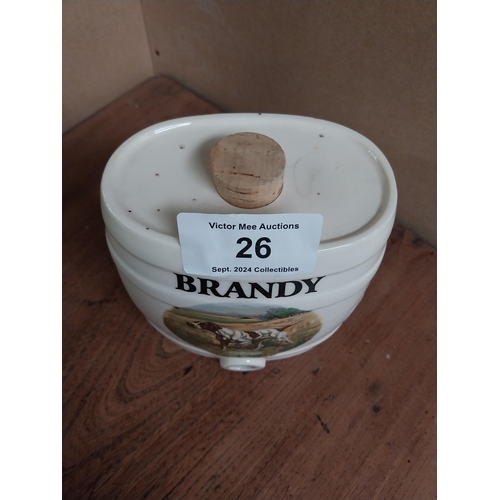 26 - Ceramic Brandy dispenser. {18 cm H x 17 cm W x 11 cm D}.