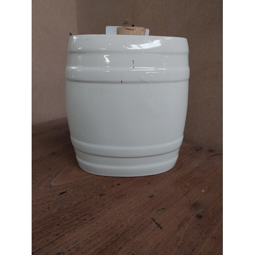 26 - Ceramic Brandy dispenser. {18 cm H x 17 cm W x 11 cm D}.