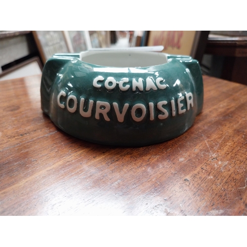 69 - Cognac Courvoisier ceramic ashtray. {5 cm H x 12 cm W x 13 cm D}.