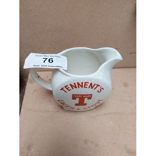 76 - Tennents Lager and Stout ceramic advertising water jug. {12 cm H x 16 cm W x 9 cm D}