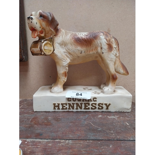 84 - Hennessey Cognac rubberoid advertising Dog figure. {24 cm H x 26 cm W x 9 cm D}.