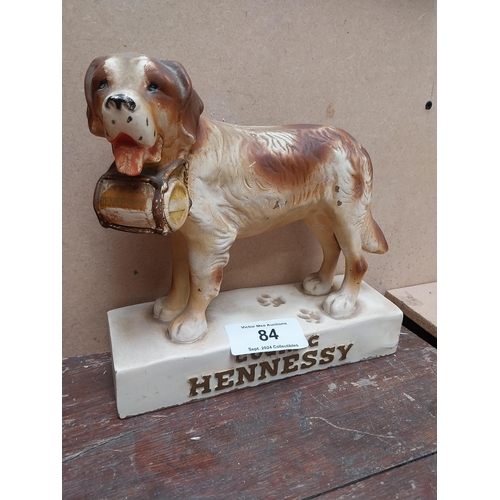 84 - Hennessey Cognac rubberoid advertising Dog figure. {24 cm H x 26 cm W x 9 cm D}.