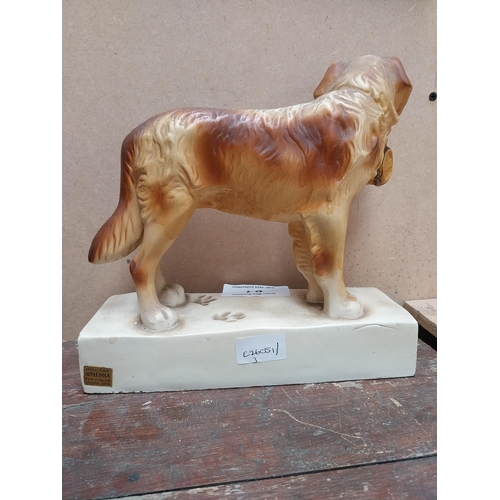 84 - Hennessey Cognac rubberoid advertising Dog figure. {24 cm H x 26 cm W x 9 cm D}.