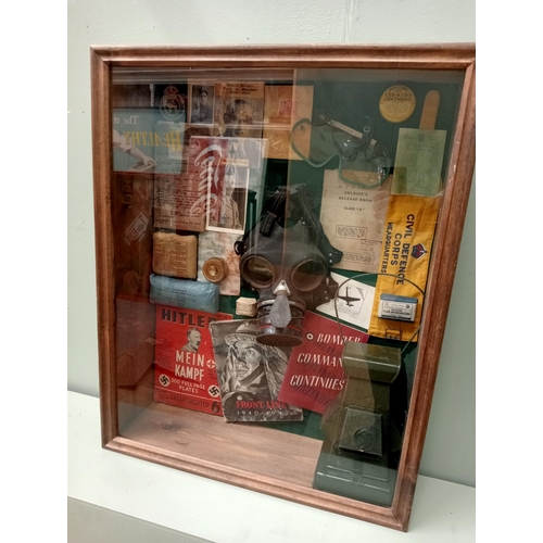 1315 - Wartime glazed showcase featuring gasmask, light , field dressings, books , old photos, etc  {H 756c... 