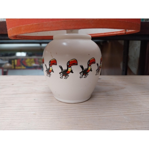 Guinness ceramic Toucan lamp with original Guinness shade. {29 cm H x
