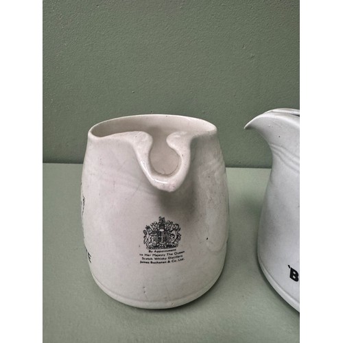 40 - Pair of Black and White Scotch Whisky Jugs  {Each H 12cm x Dia 17cm } - NOT AVAILABLE TO VIEW IN PER... 