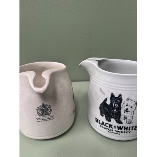 40 - Pair of Black and White Scotch Whisky Jugs  {Each H 12cm x Dia 17cm } - NOT AVAILABLE TO VIEW IN PER... 