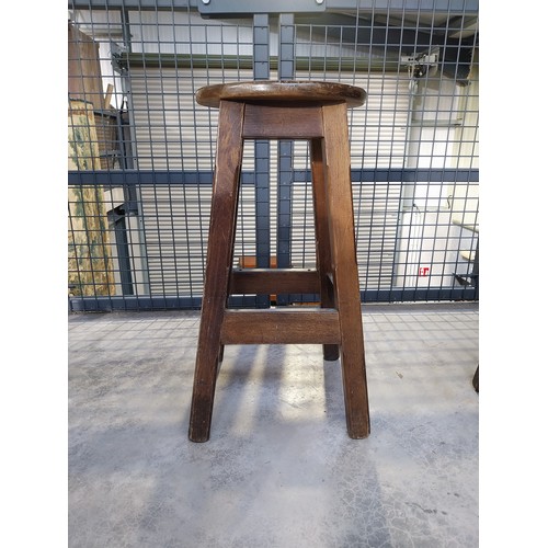 1265 - Five early 1970's mahogany and brass bar stools. {75 cm H x 36 cm Diam.}.