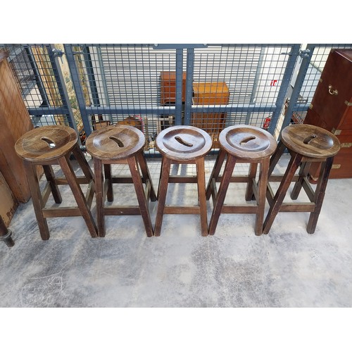 1265 - Five early 1970's mahogany and brass bar stools. {75 cm H x 36 cm Diam.}.