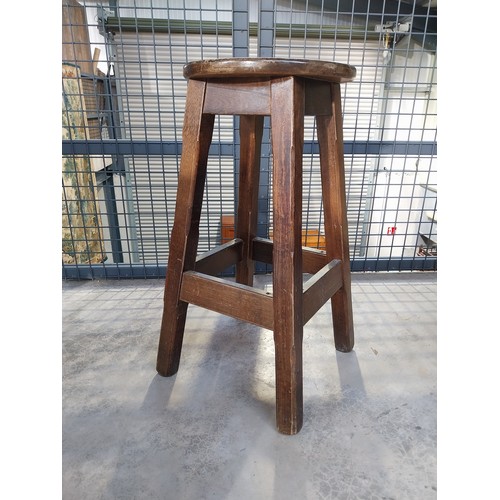 1265 - Five early 1970's mahogany and brass bar stools. {75 cm H x 36 cm Diam.}.