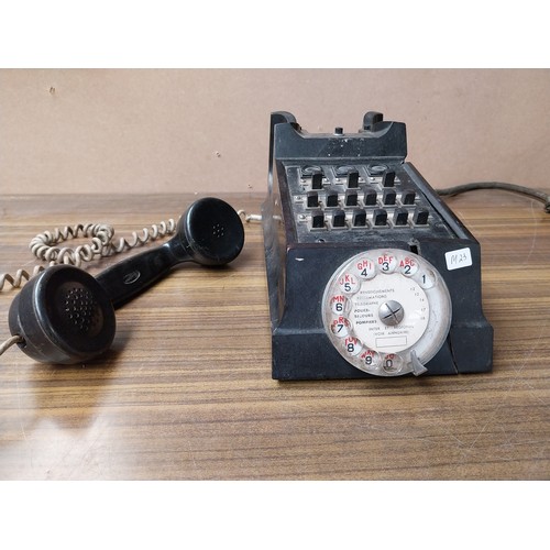 1290 - Bakelite telephone. {15 cm H x 30 cm W x 15 cm D}.