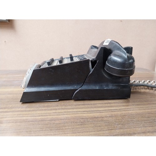 1290 - Bakelite telephone. {15 cm H x 30 cm W x 15 cm D}.