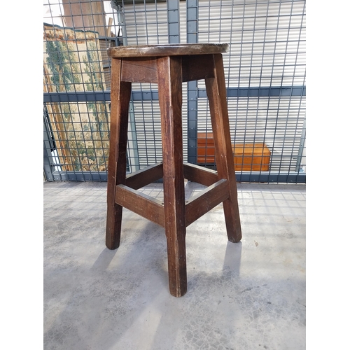 1265 - Five early 1970's mahogany and brass bar stools. {75 cm H x 36 cm Diam.}.