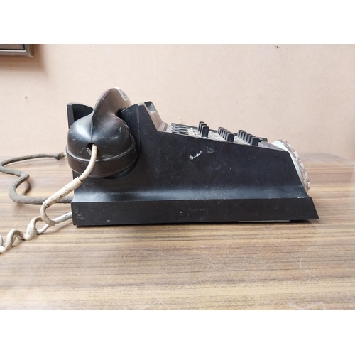 1290 - Bakelite telephone. {15 cm H x 30 cm W x 15 cm D}.