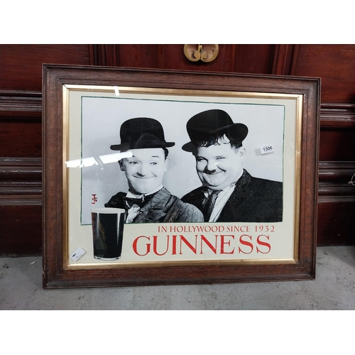 1306 - Guinness in Hollywood since 1932 framed advertising print. {59 cm H x 77 cm W}.