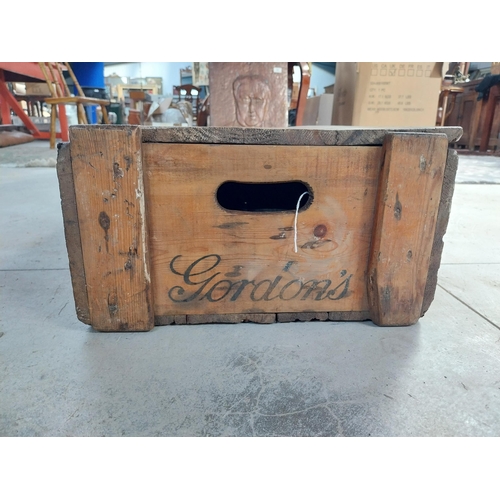 1364 - Gordon's London Gin wooden advertising crate. {20 cm H x 69 cm W x 38 cm D}.