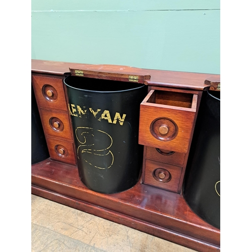 104 - Mahogany coffee bar/counter with four coffee bins and fifteen drawers {91cm H x 334cm W x 52cm D} 