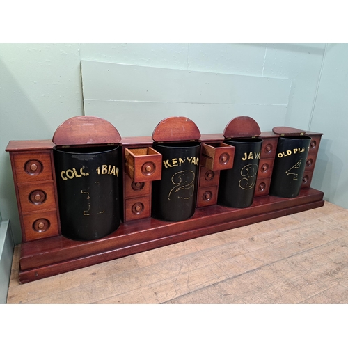 104 - Mahogany coffee bar/counter with four coffee bins and fifteen drawers {91cm H x 334cm W x 52cm D} 