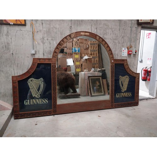 1280 - 20th C. Guinness mahogany bar back originally from The O'Conor Don pub London the centre mirror flan... 