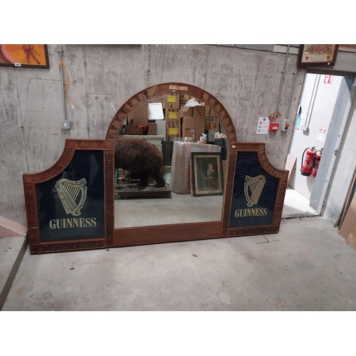 1280 - 20th C. Guinness mahogany bar back originally from The O'Conor Don pub London the centre mirror flan... 