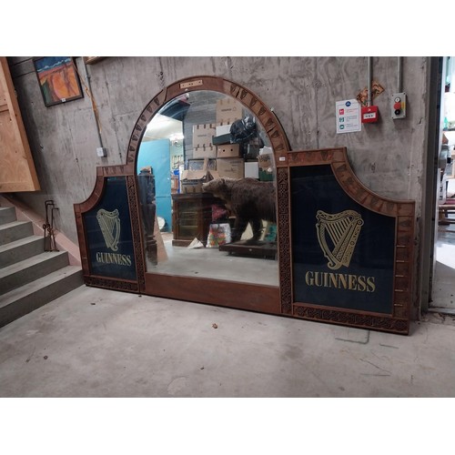 1280 - 20th C. Guinness mahogany bar back originally from The O'Conor Don pub London the centre mirror flan... 